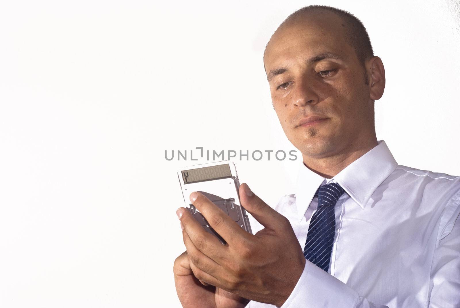 businessman use calculator by gandolfocannatella