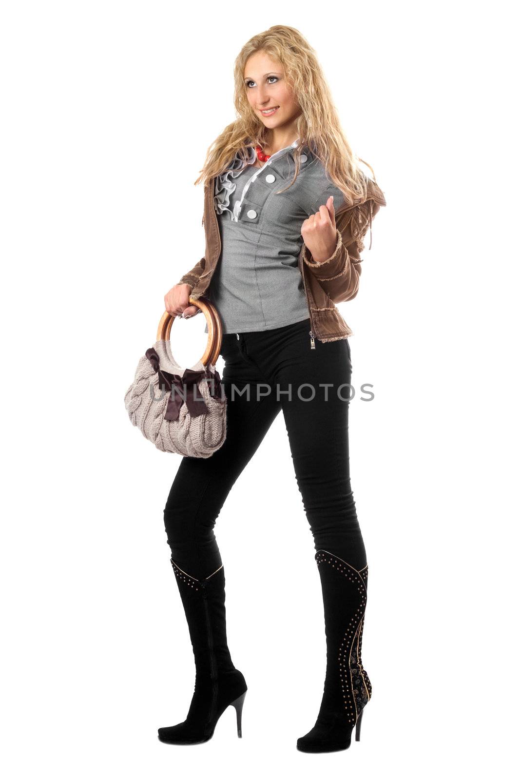Beautiful playful young blonde with a handbag. Isolated