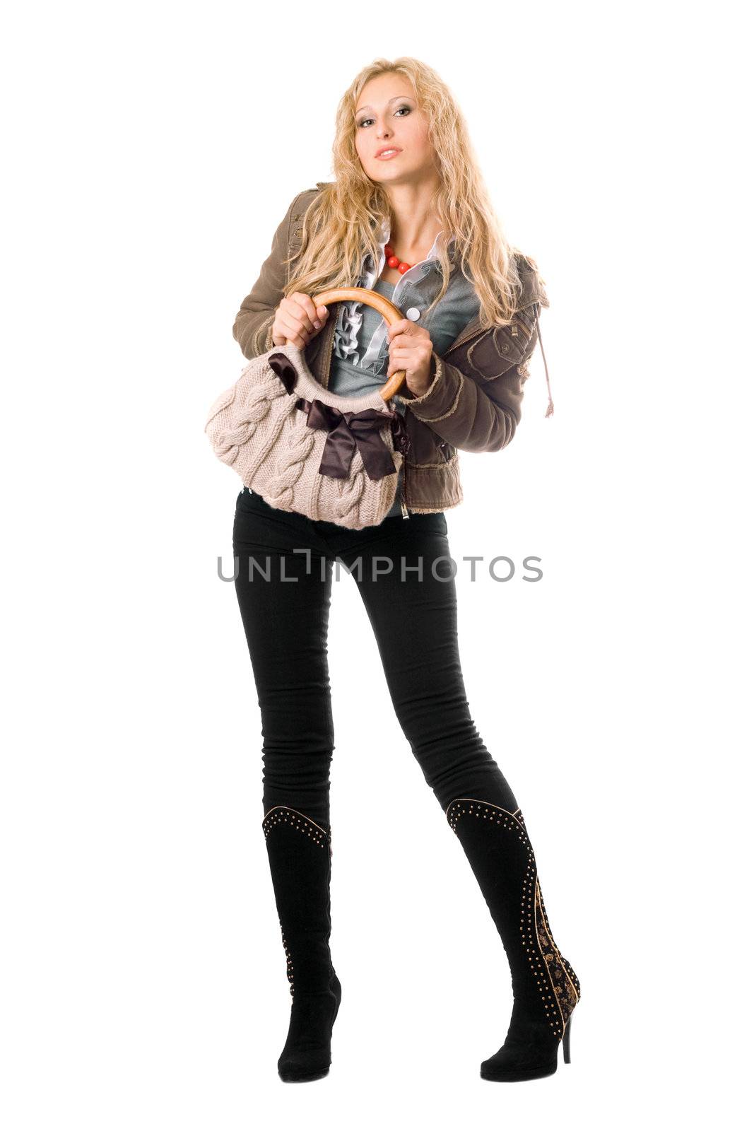 Sexy young blonde with a handbag. Isolated on white