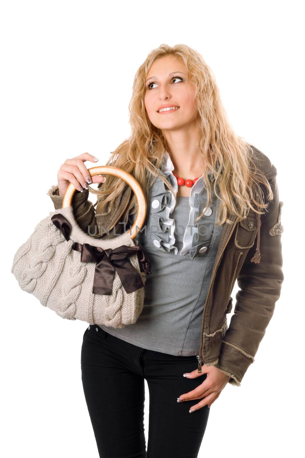 Portrait of pretty young blonde with a handbag. Isolated