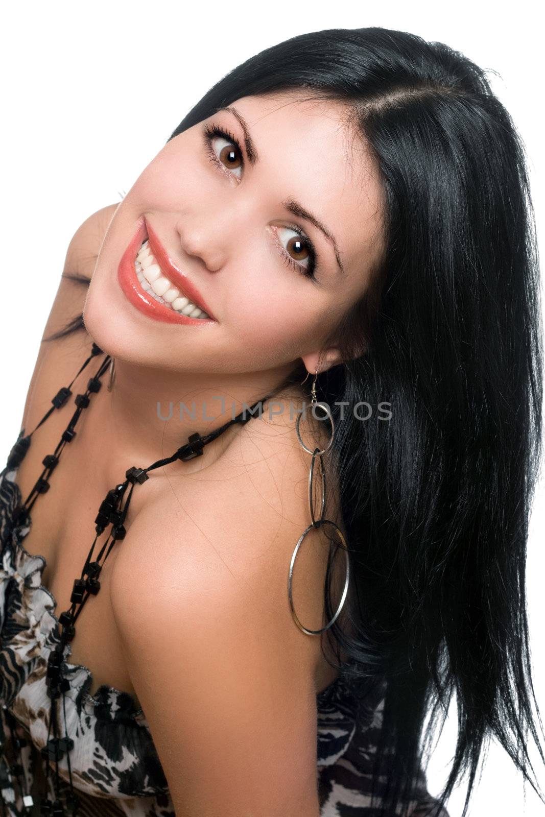 Portrait of a smiling beautiful young brunette. Isolated