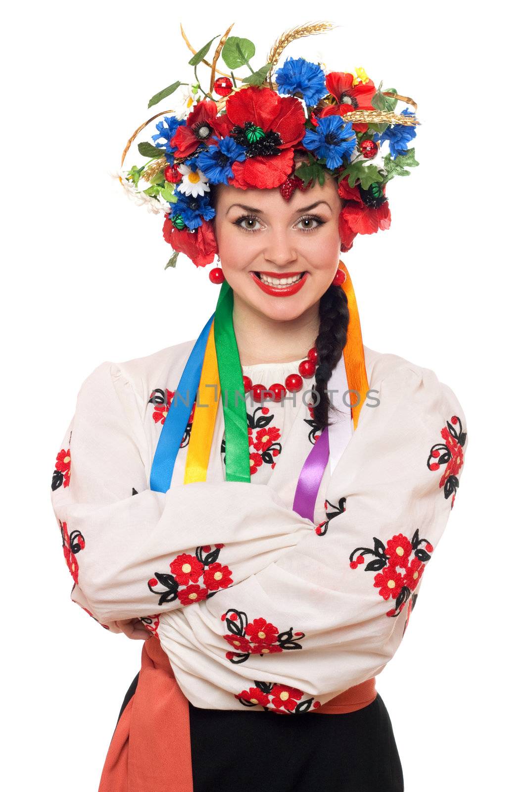 Portrait of young woman in the Ukrainian national clothes. Isolated