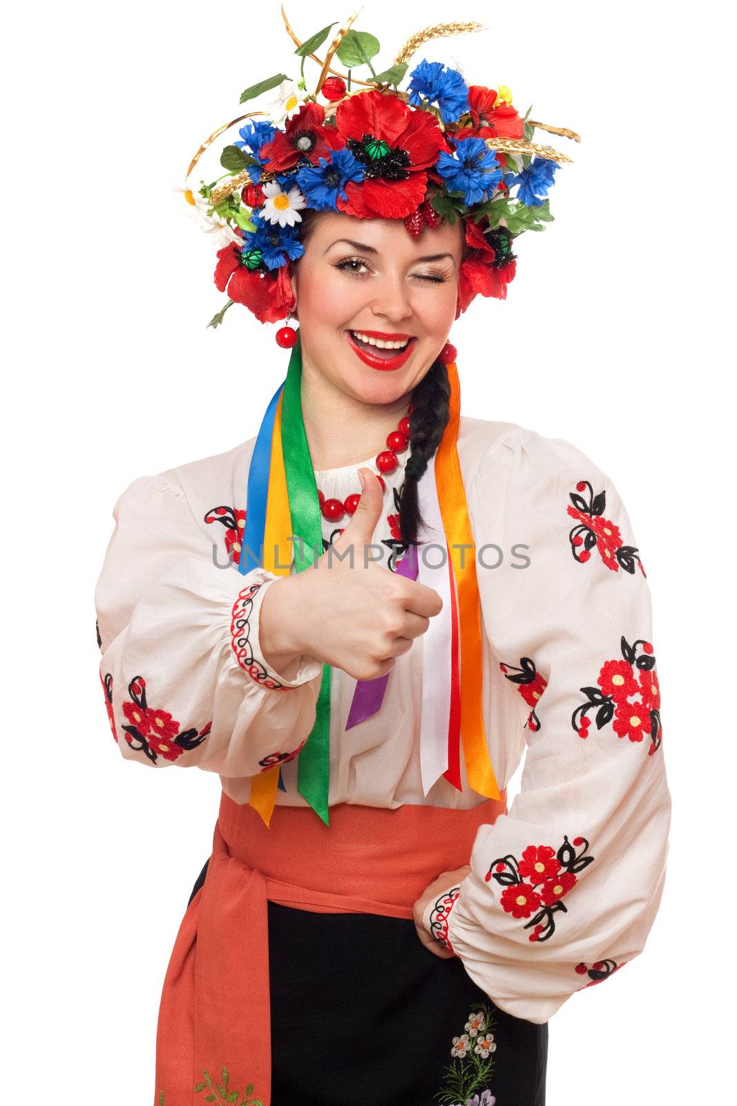 Portrait of joyful young woman in the Ukrainian national clothes