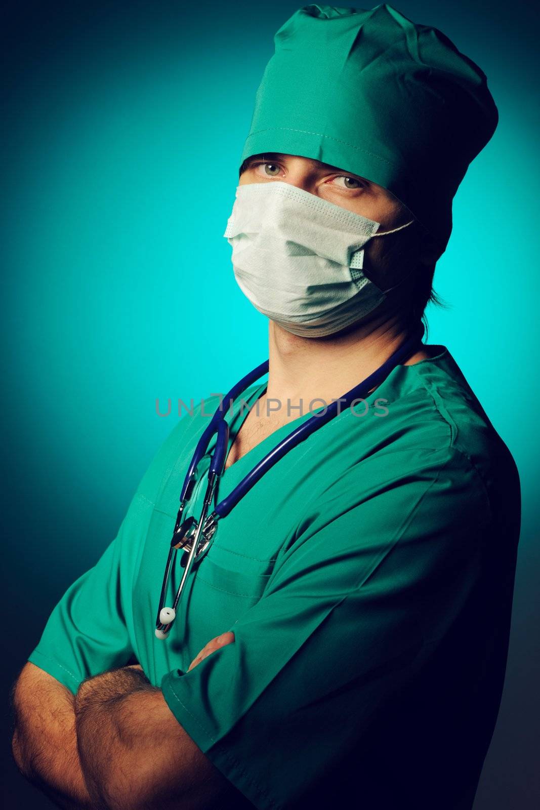 Surgeon with stethoscope over blue background