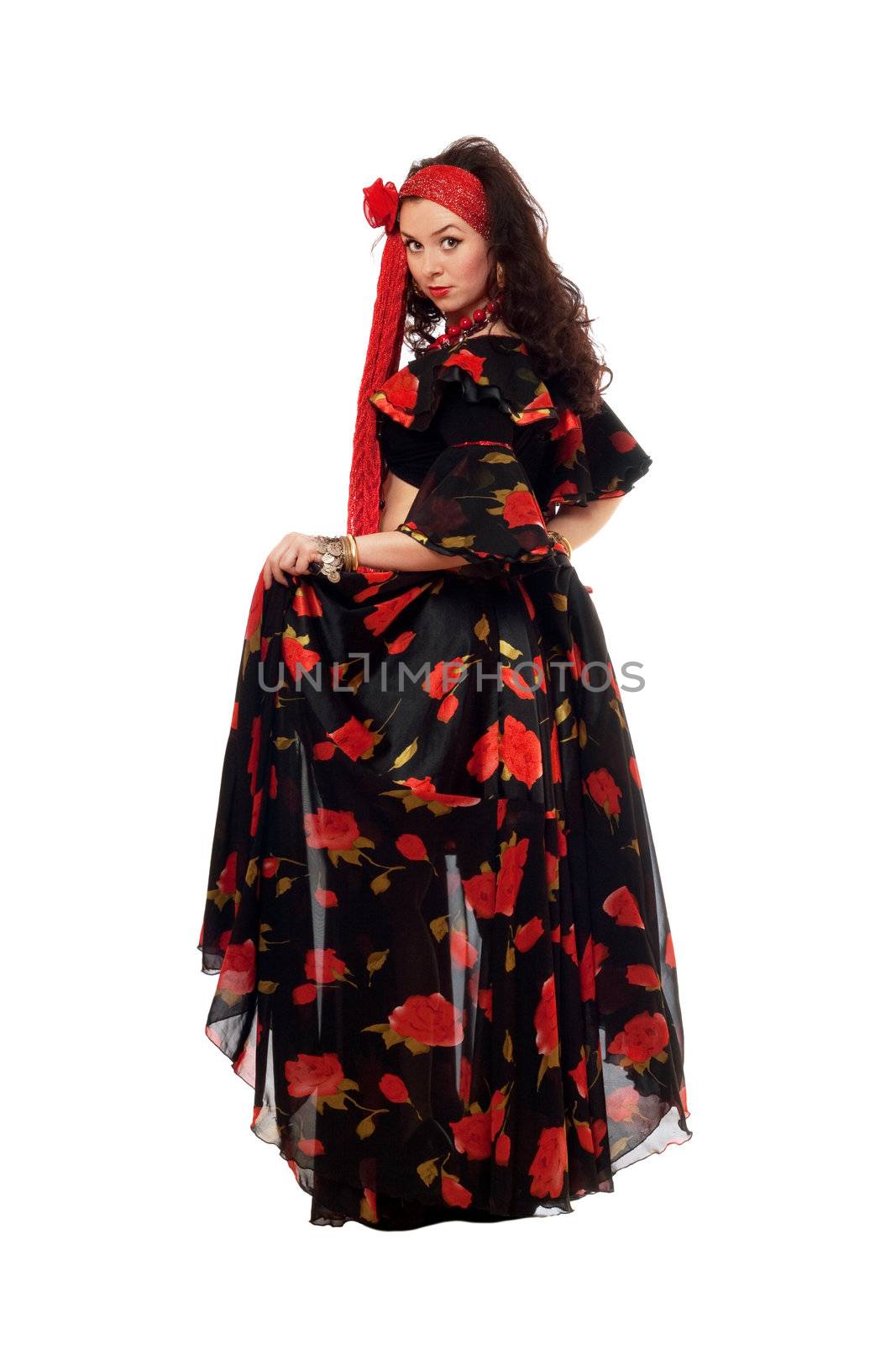 Gypsy woman in a black skirt. Isolated