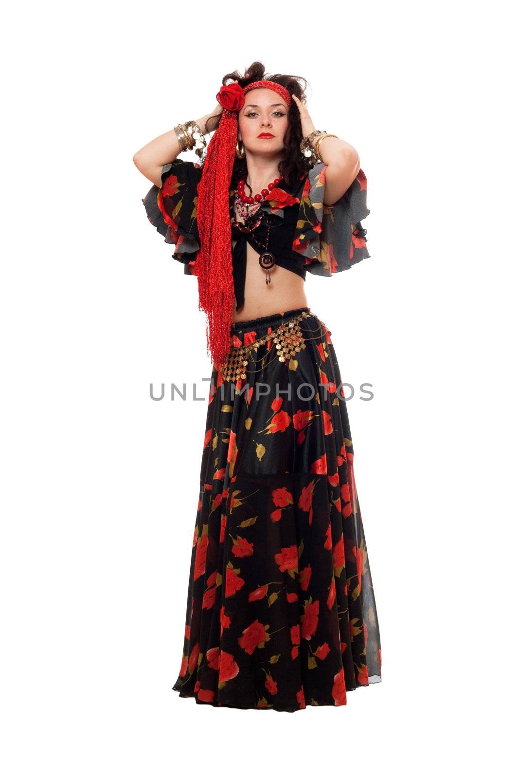 Gypsy woman in a black skirt. Isolated on white