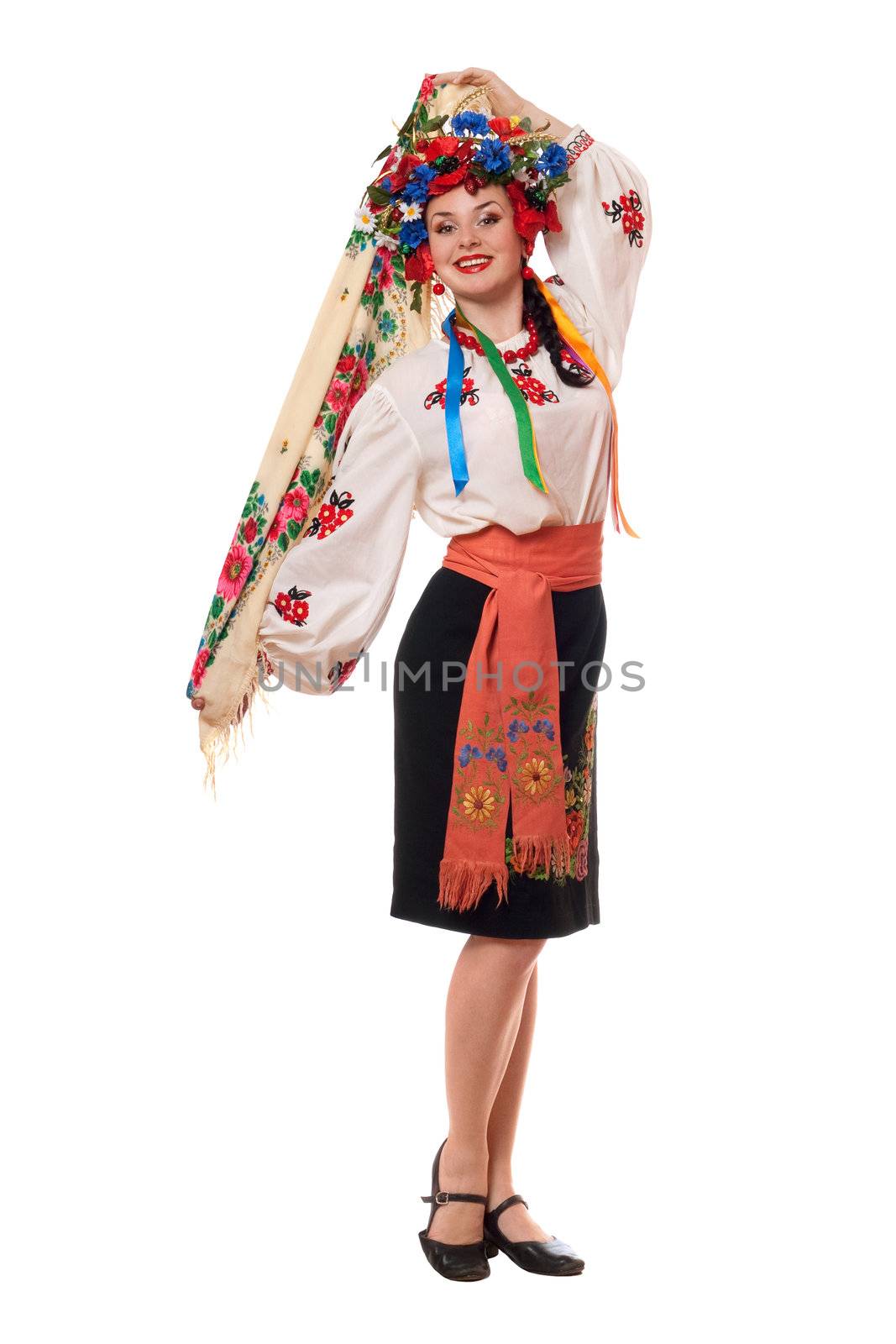 Attractive woman in the Ukrainian national clothes. Isolated