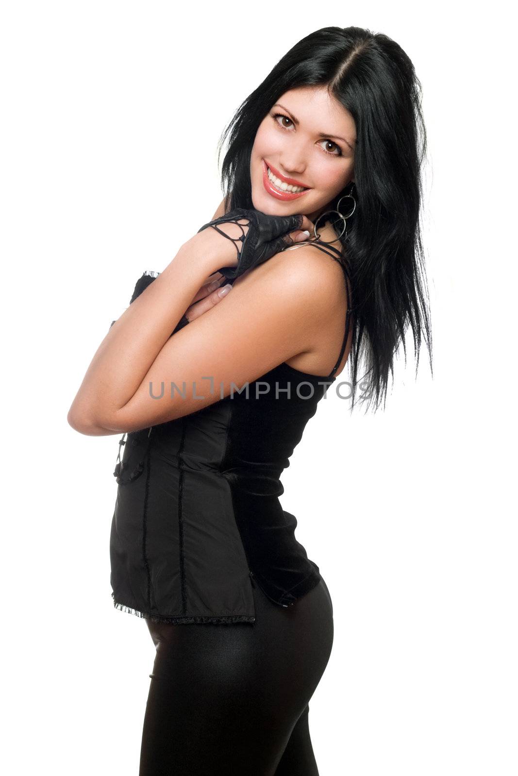 Portrait of a cheerful brunette in black clothes. Isolated