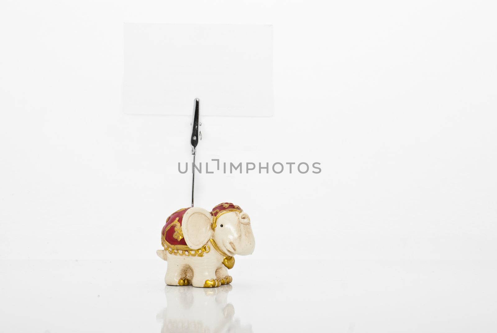  Lucky Elephant memo holder with blank card isolated on a white background.