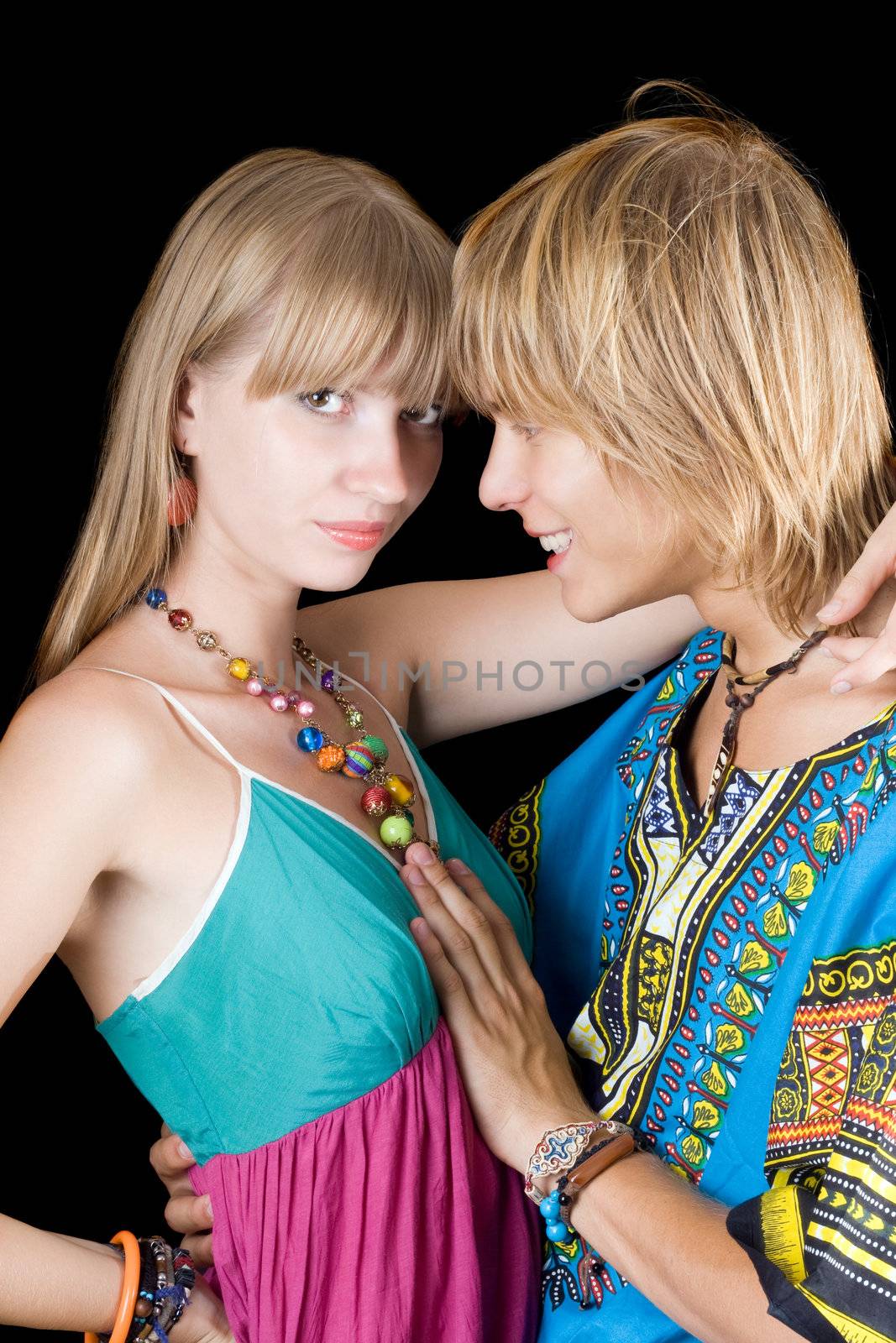 Young beauty couple. Isolated on black background