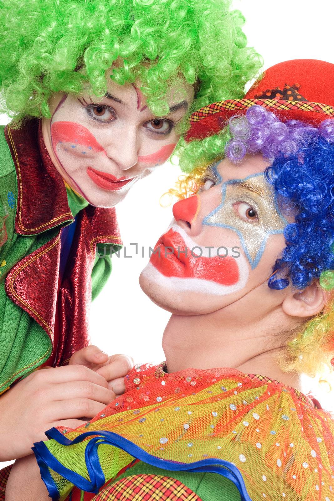Portrait of a couple of clowns. Isolated on white