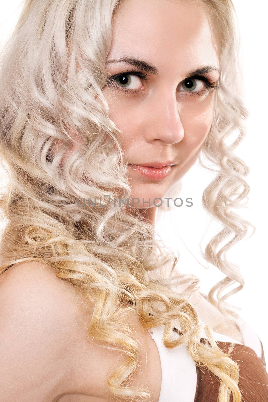 Closeup portrait of lovely young blonde. Isolated
