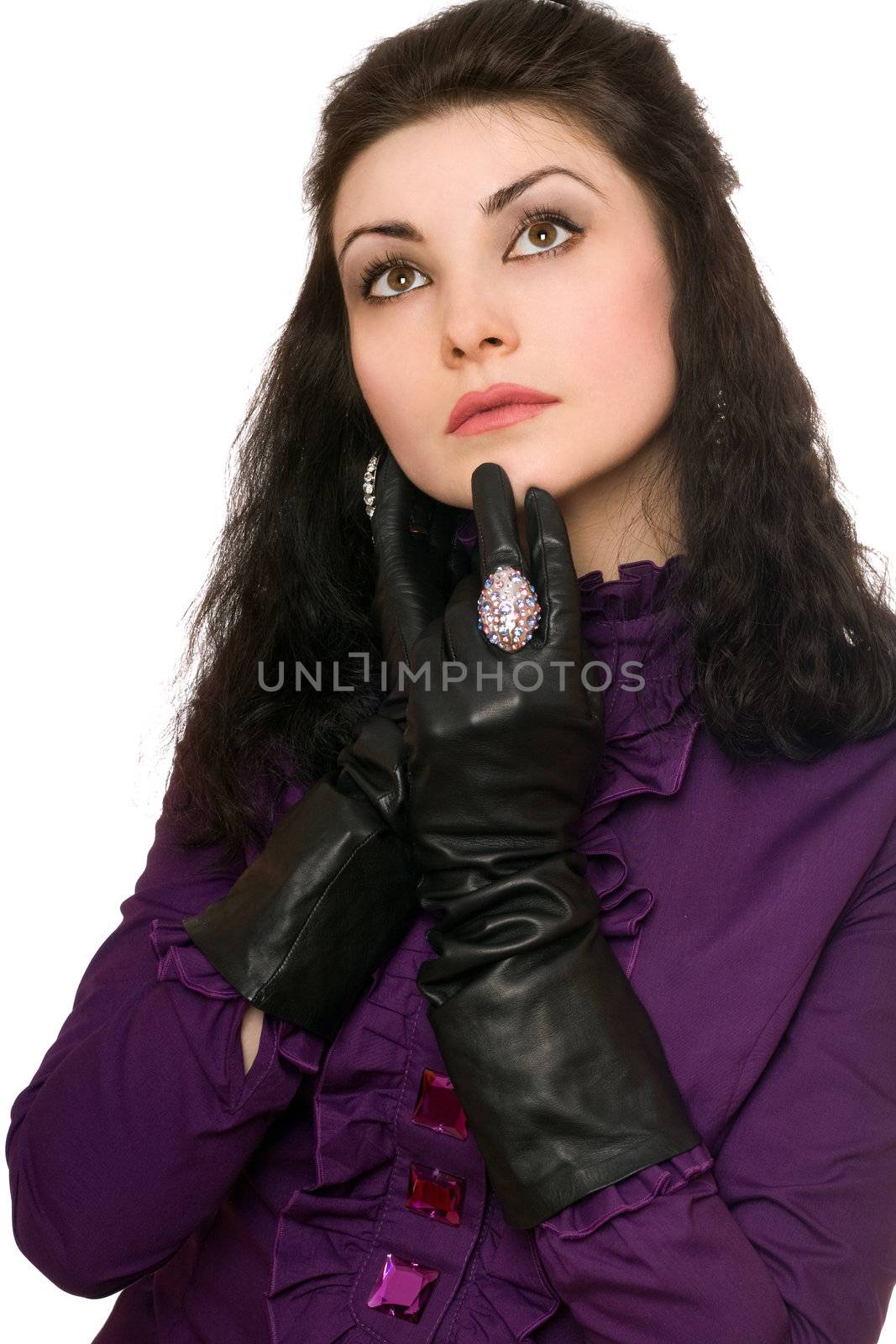 Portrait of thoughtful young woman in a purple jacket