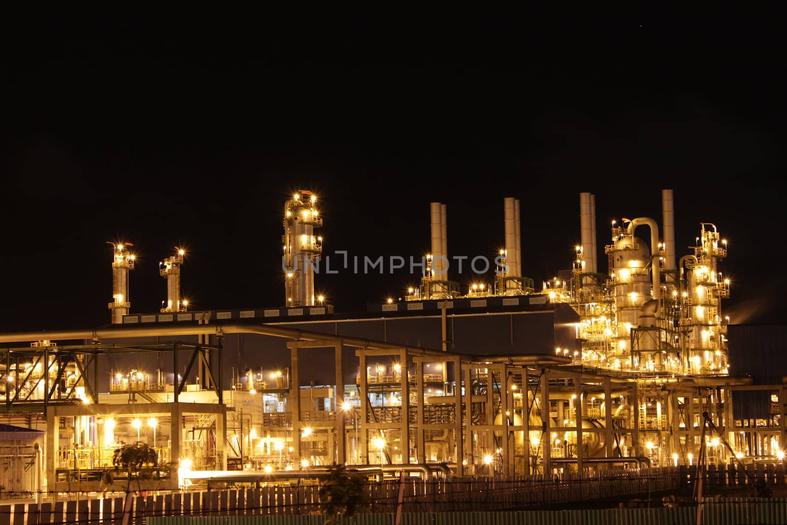 Chemical industrial in the night with beautiful lighting, Maptaphut industrial , Thailand