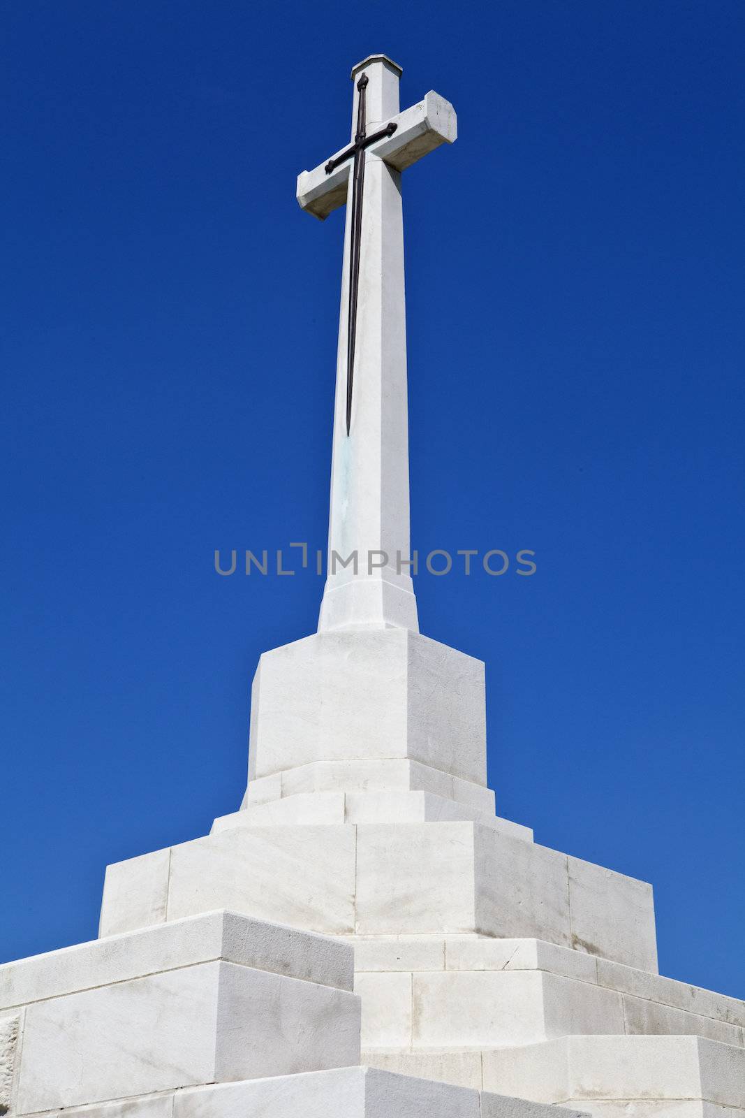 Cross of Sacrifice at Tyne Cot Cemetery in Ypres, Belgium.  Tyne Cot Commonwealth War Graves Cemetery and Memorial to the Missing is a Commonwealth War Graves Commission (CWGC) burial ground for the dead of the First World War in the Ypres Salient on the Western Front.