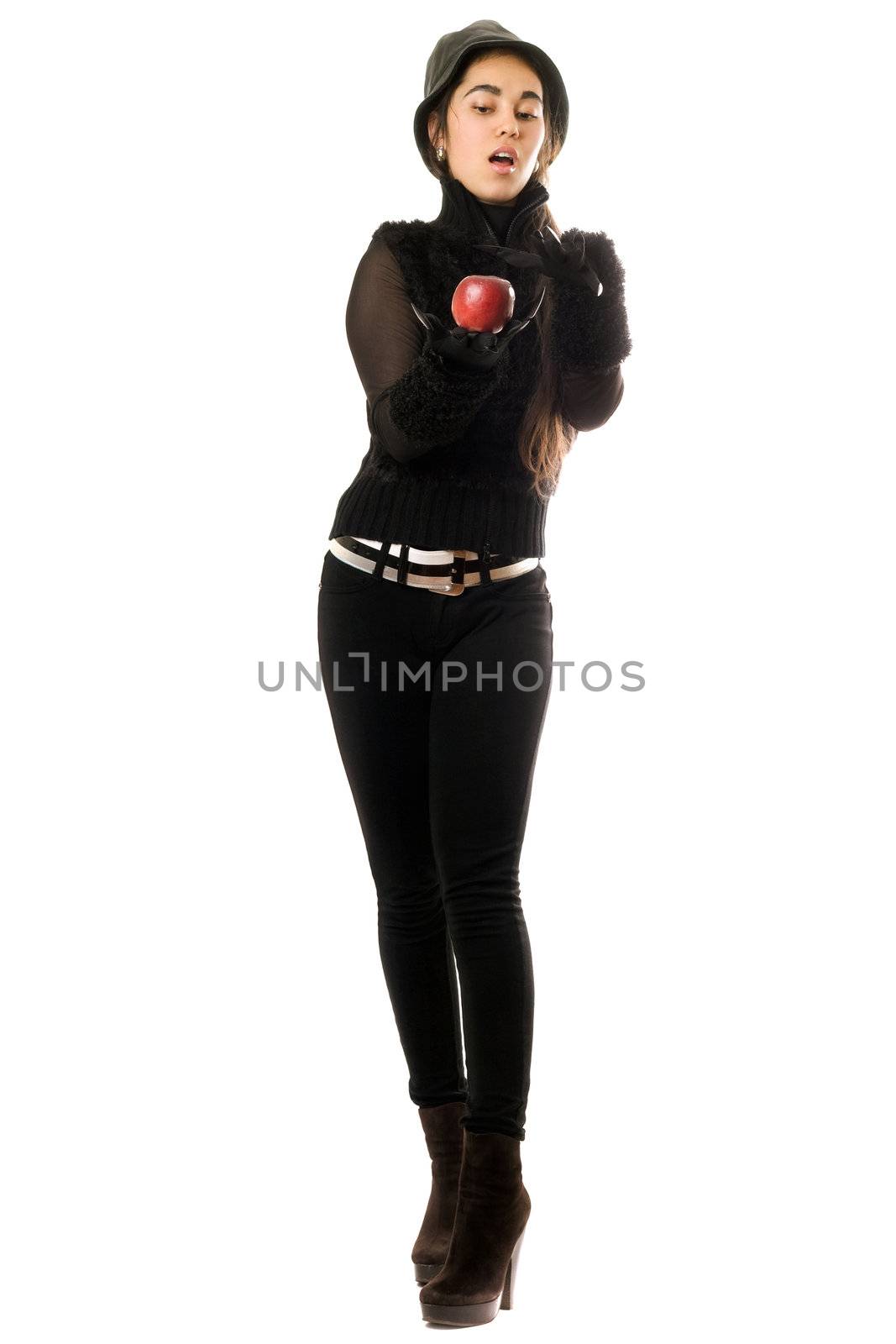 Pretty young brunette in gloves with apple
