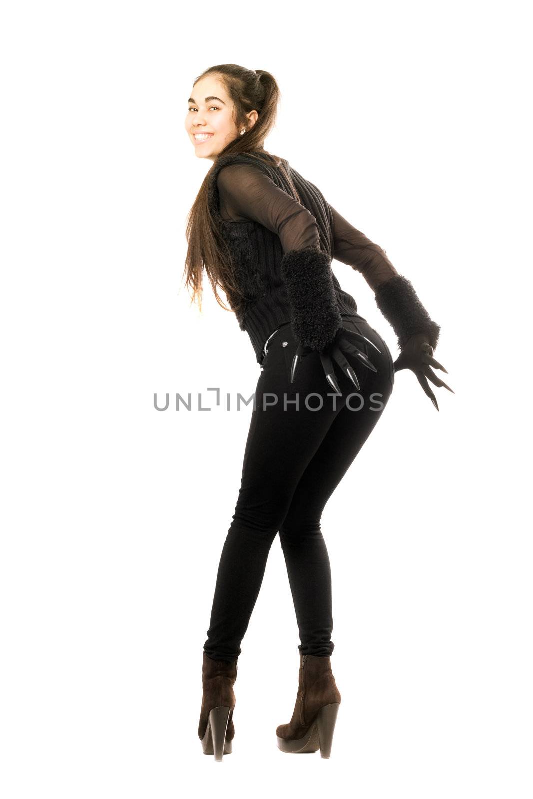 Playful brunette in gloves with claws. Isolated