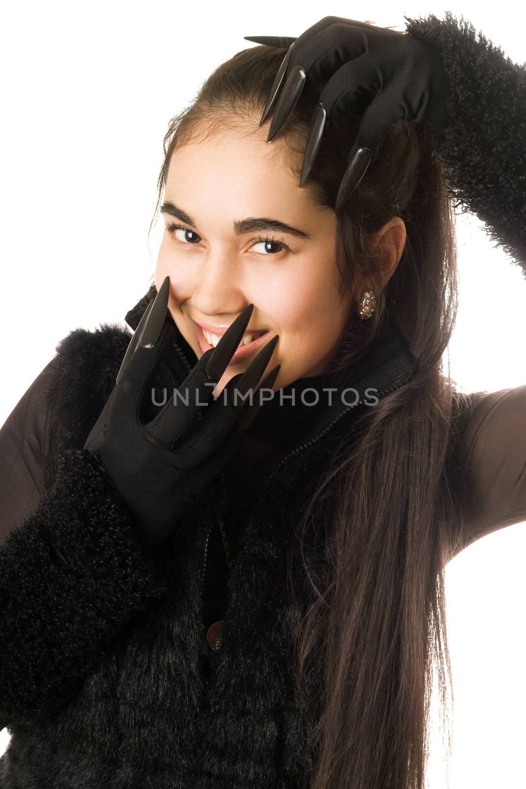 Portrait of joyful young woman in gloves with claws