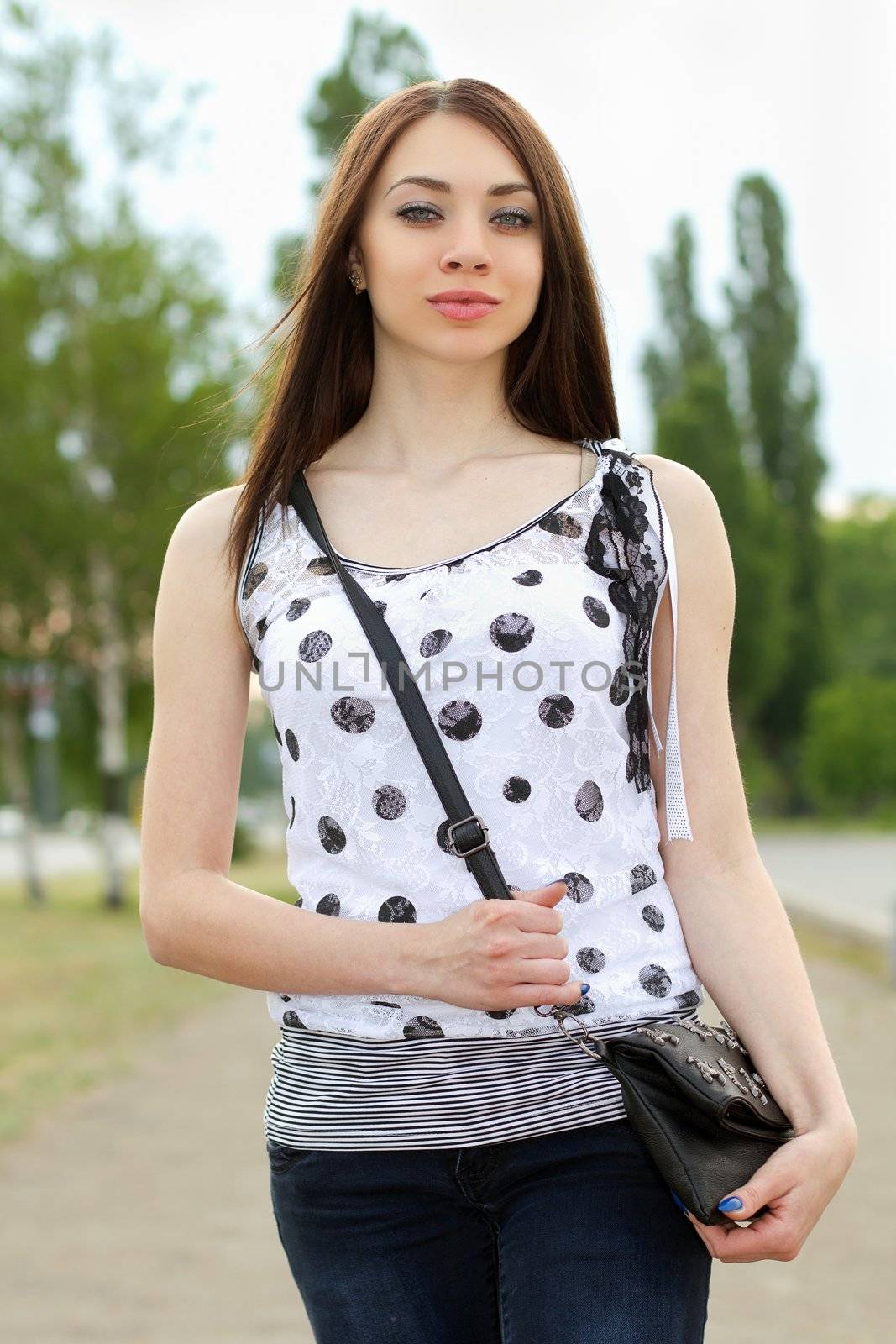 Portrait of a perfect young woman outdoors