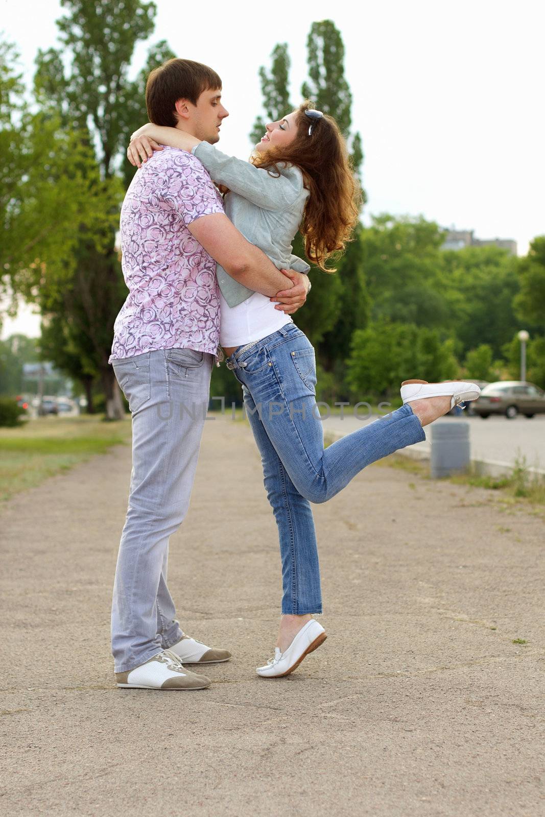 Couple of playful young people on the street