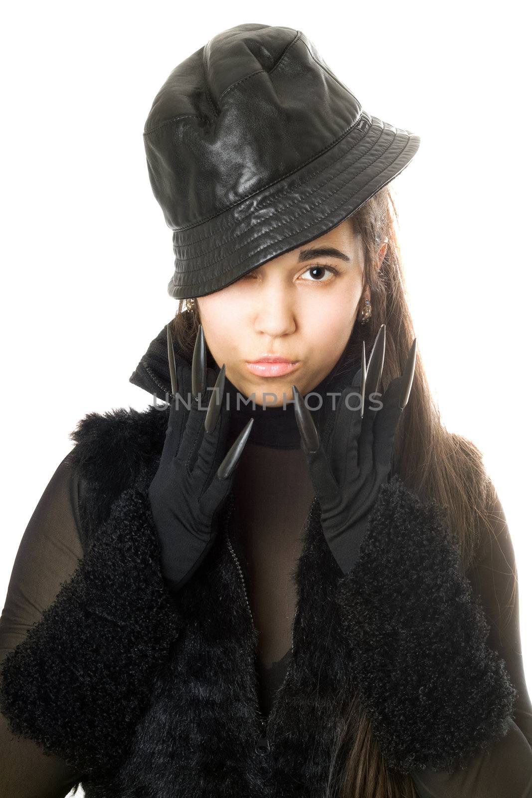 Portrait of attractive young brunette in gloves with claws. Isolated