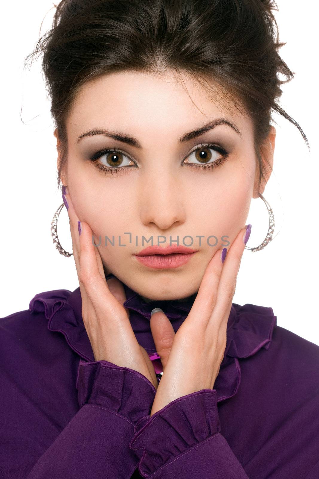 Closeup portrait of pretty young woman in a purple jacket