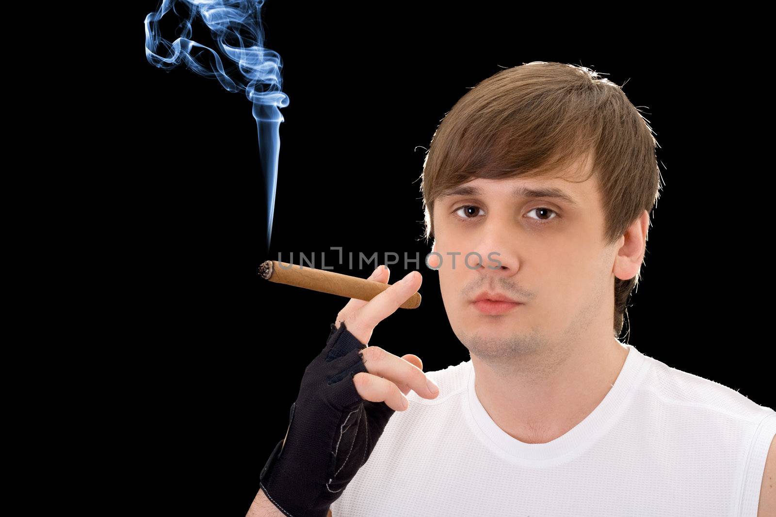 Portrait of the young man with a cigar