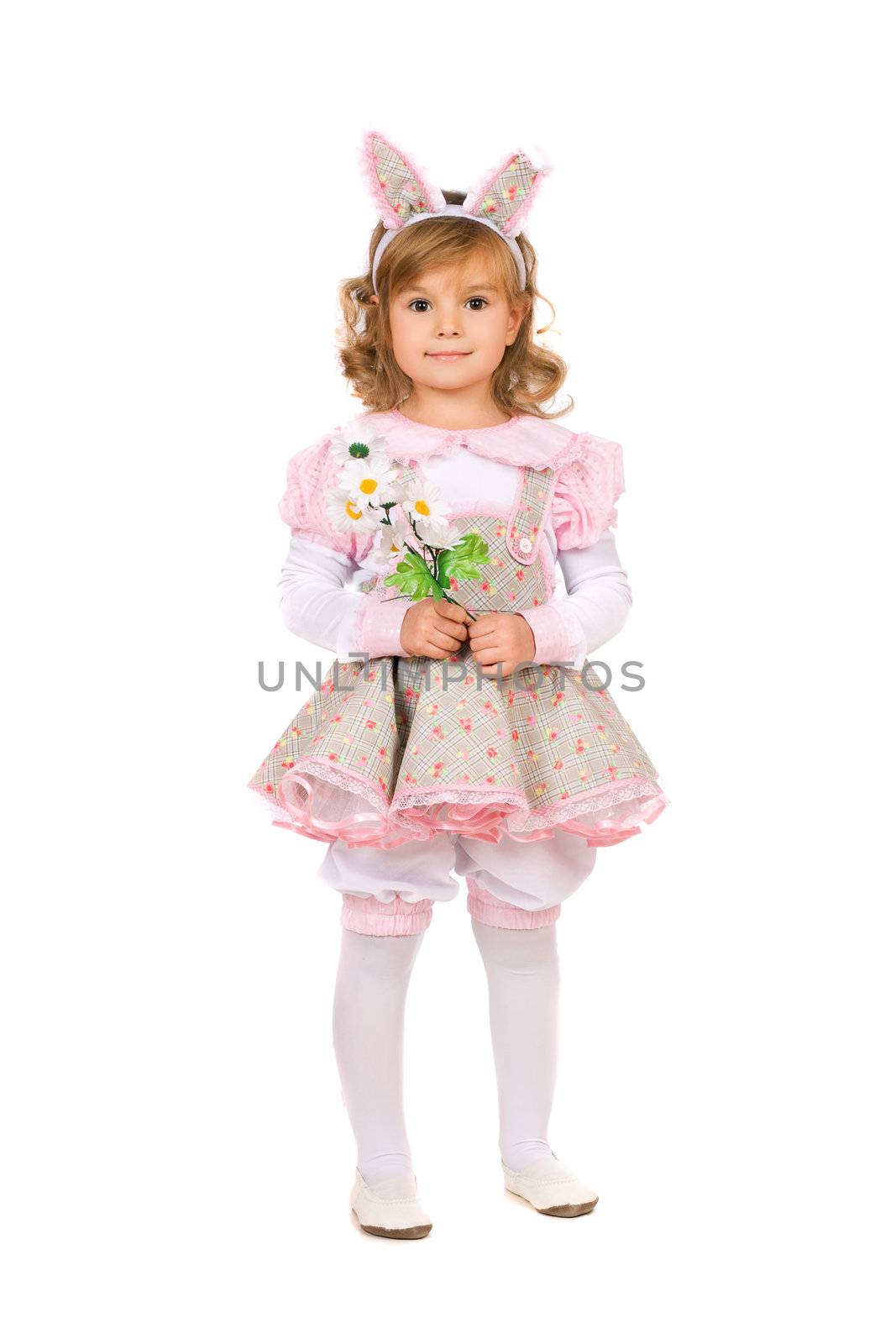 Girl with flowers in hands wearing a dress