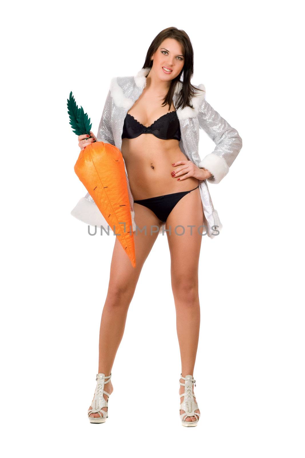Pretty sexy young brunette with a carrot