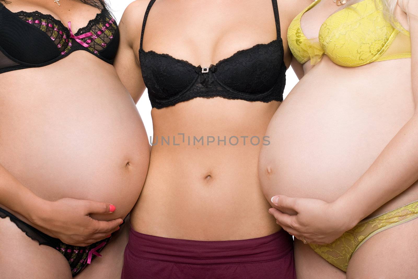 Three female tummy. Isolated by acidgrey