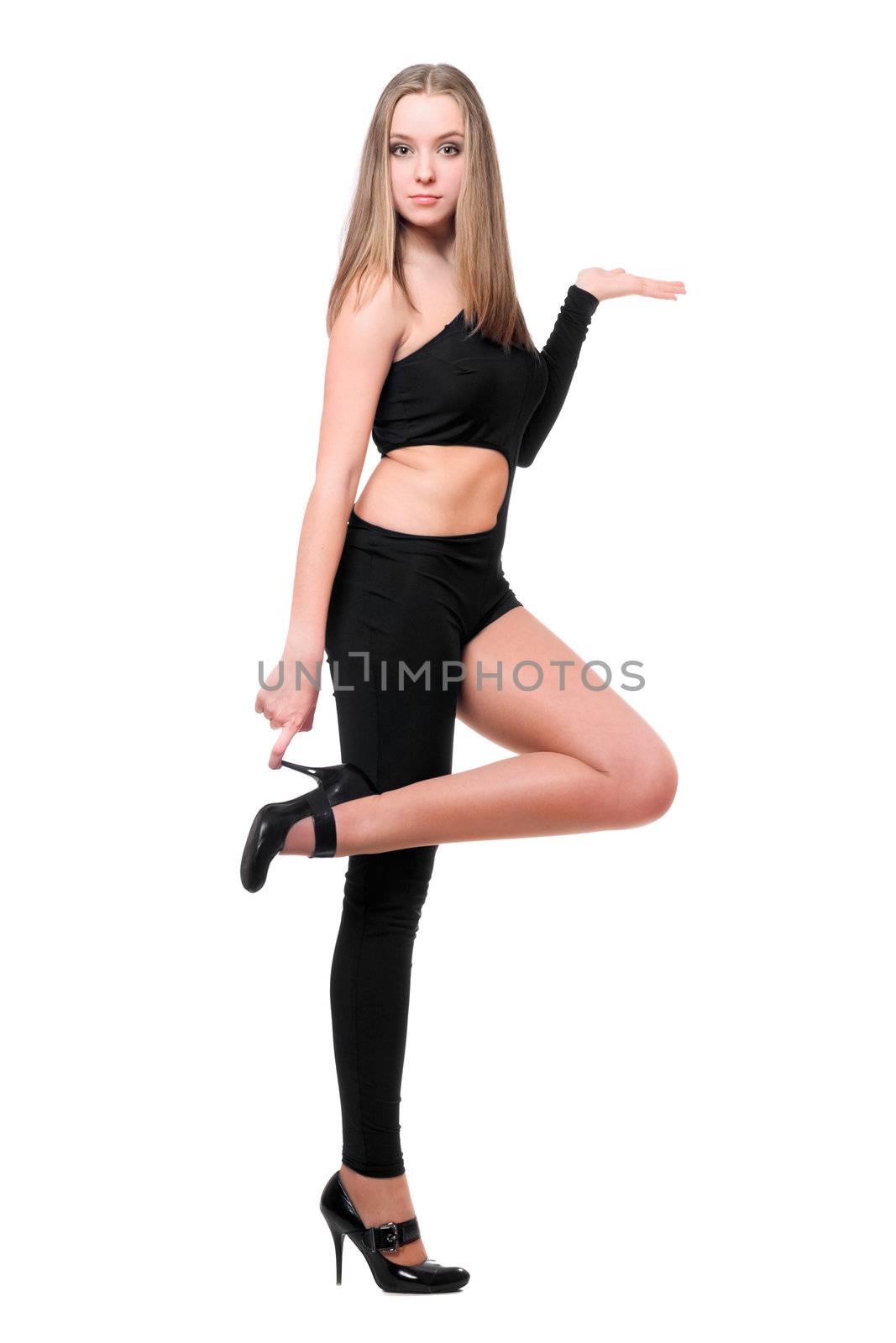 Lovely young woman in skintight black costume. Isolated