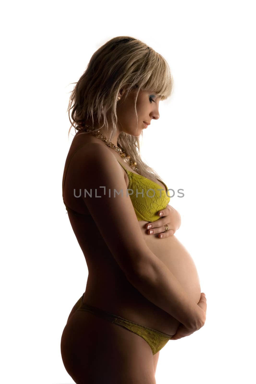 Pregnant young woman. Isolated on white background