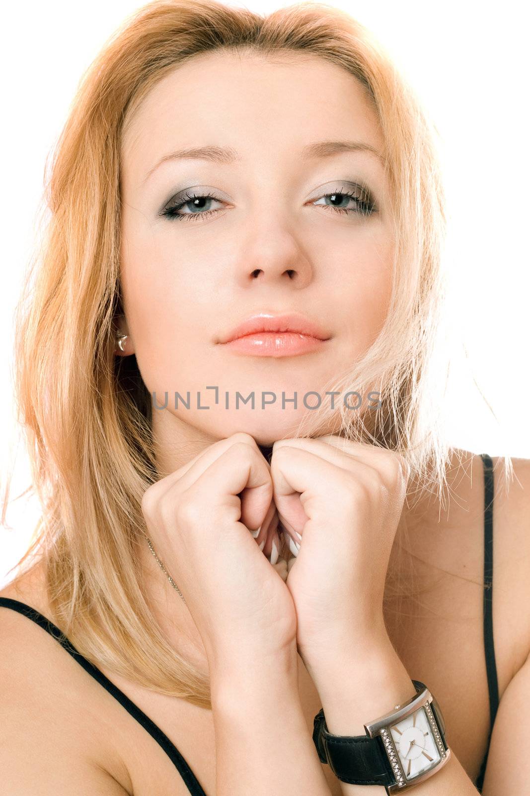 Closeup portrait of a pretty young blonde. Isolated