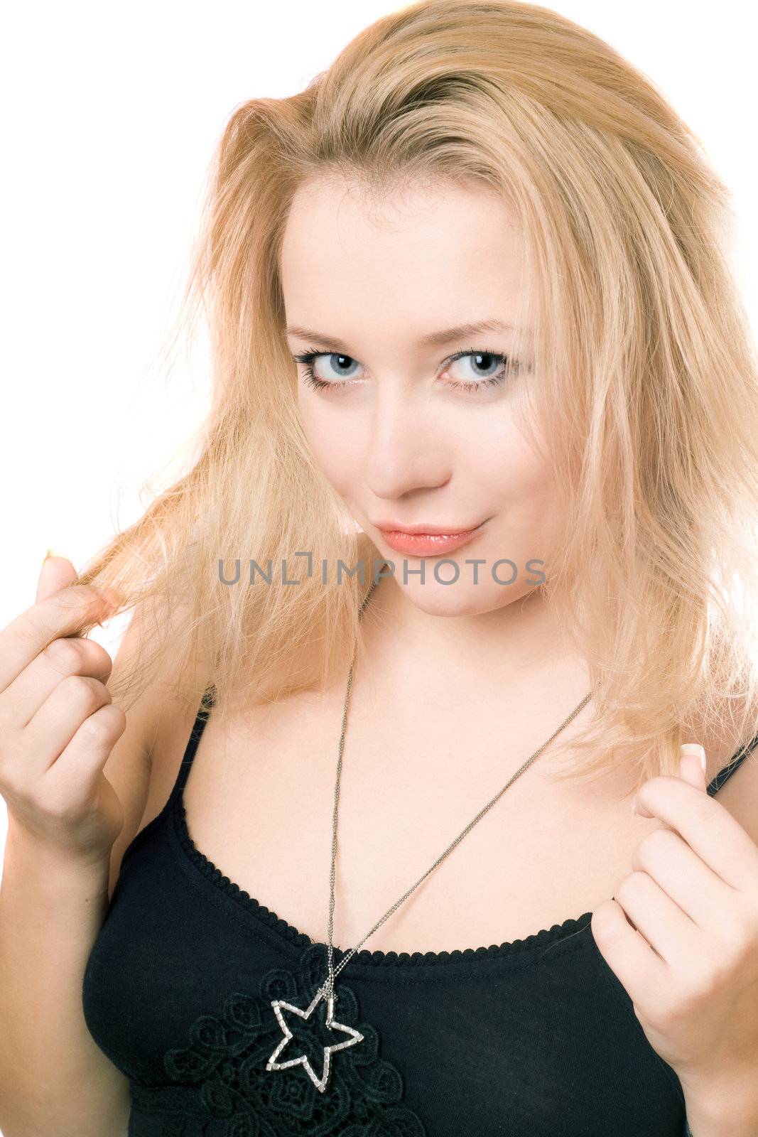 Closeup portrait of a attractive young blonde. Isolated