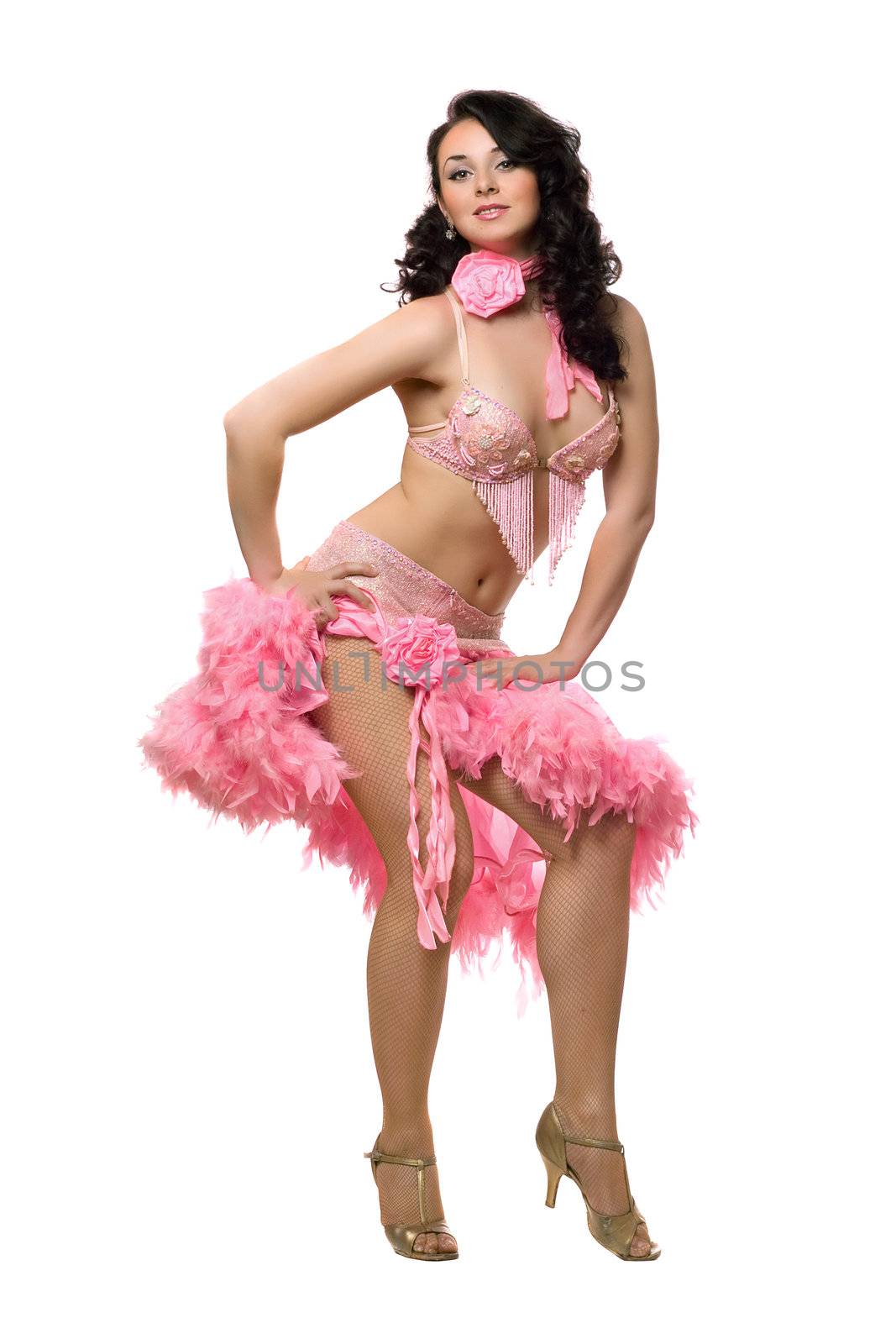 Pretty brunette in pink dancing dress. Isolated on white