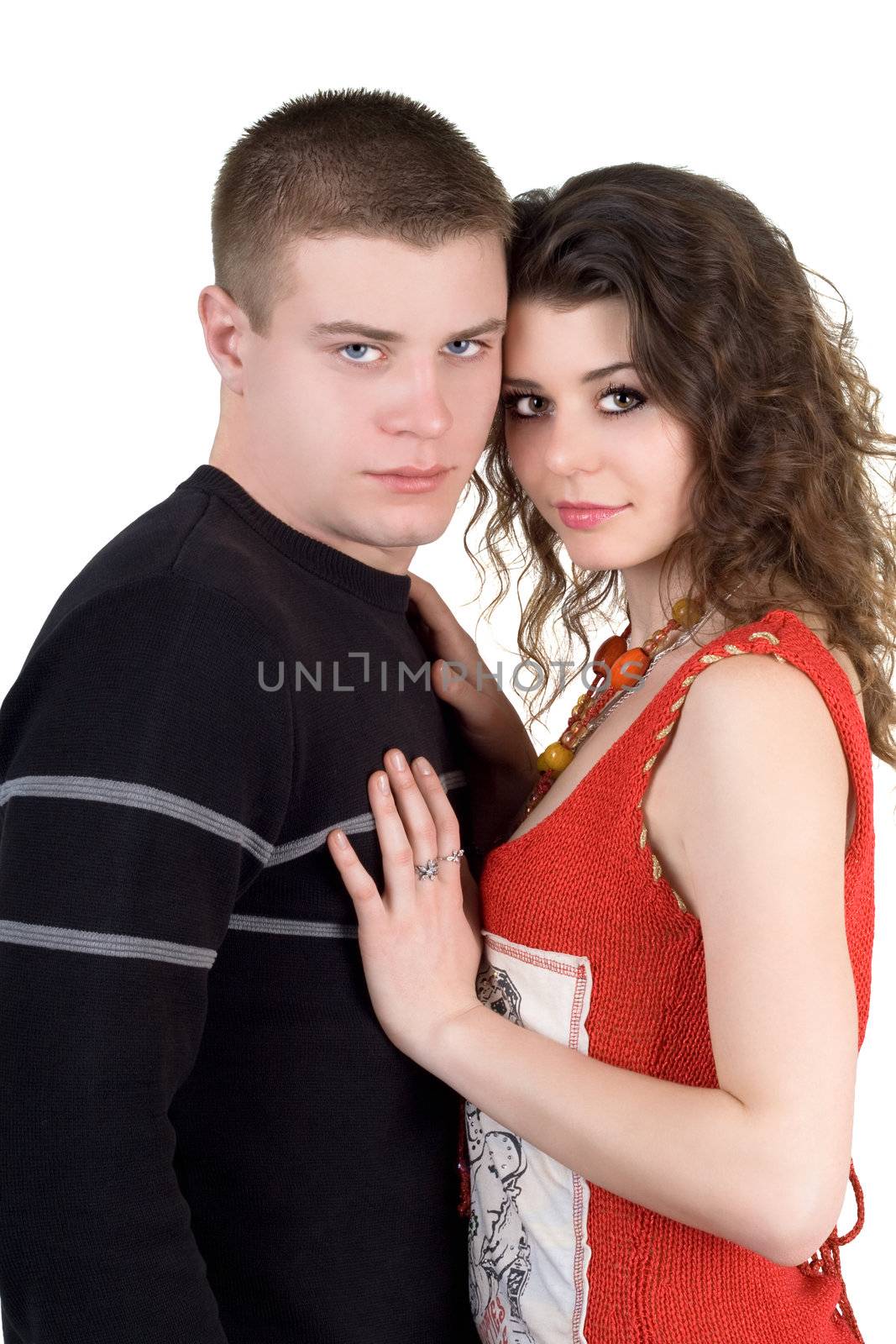 Portrait of the beautiful young couple. Isolated on white