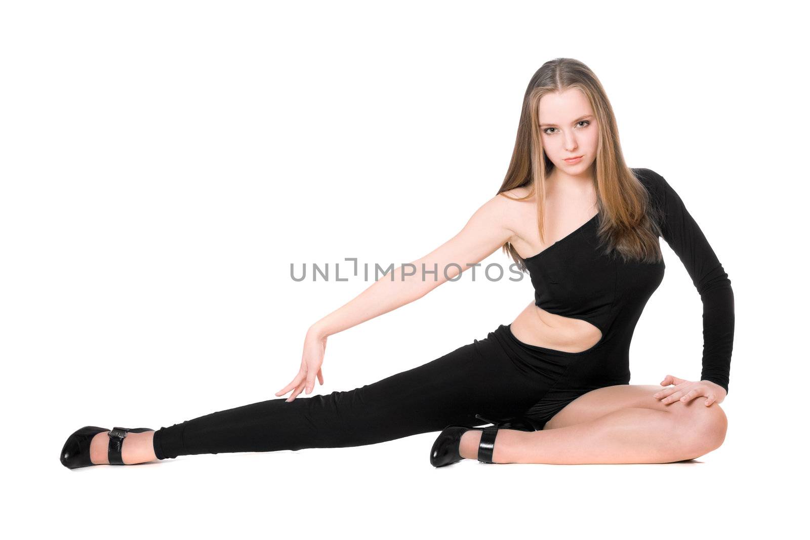 Sexy leggy girl sitting in a black tight-fitting body suit dance
