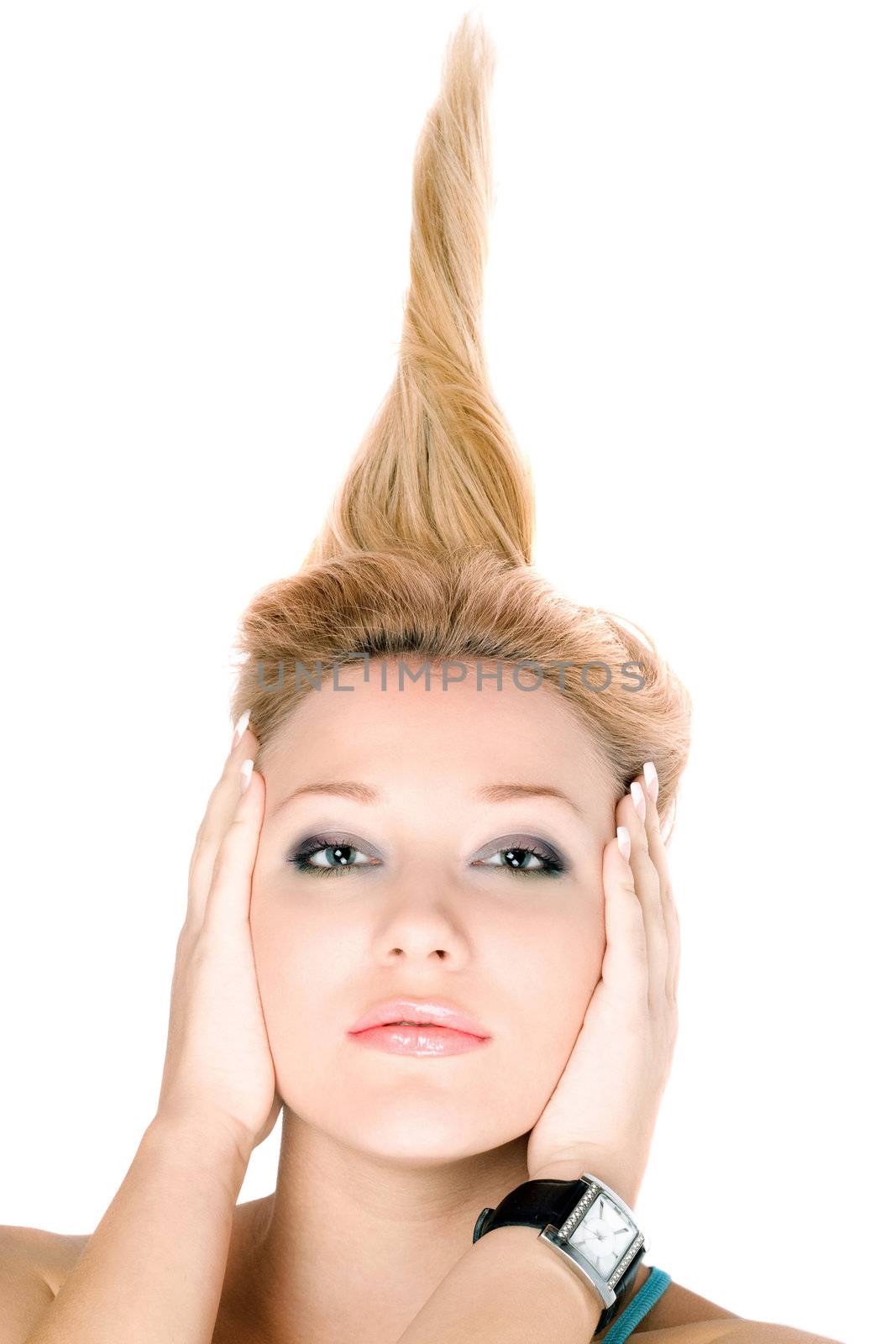 Closeup portrait of blond girl lying on a white