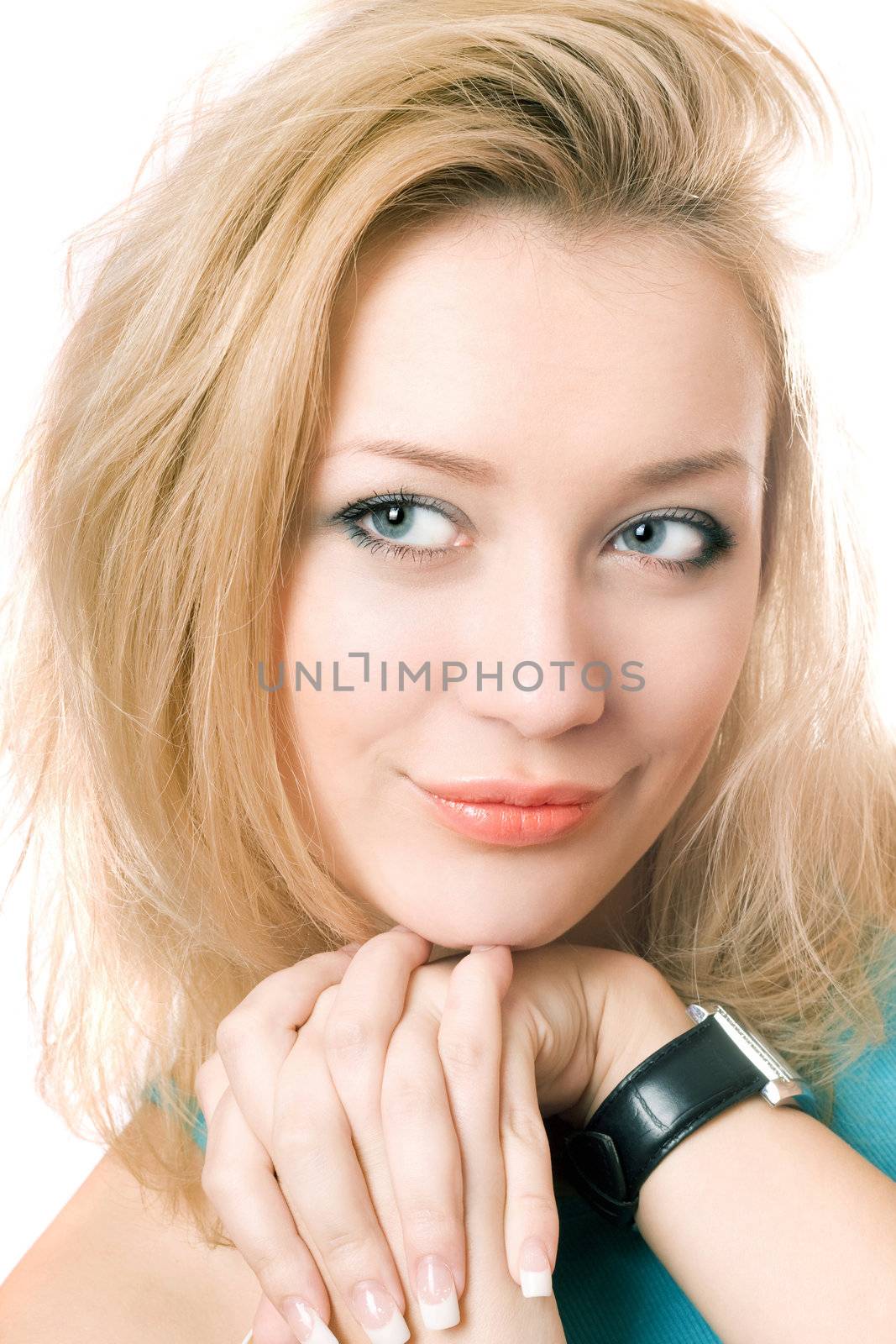 Closeup portrait of a young blonde. Isolated on white