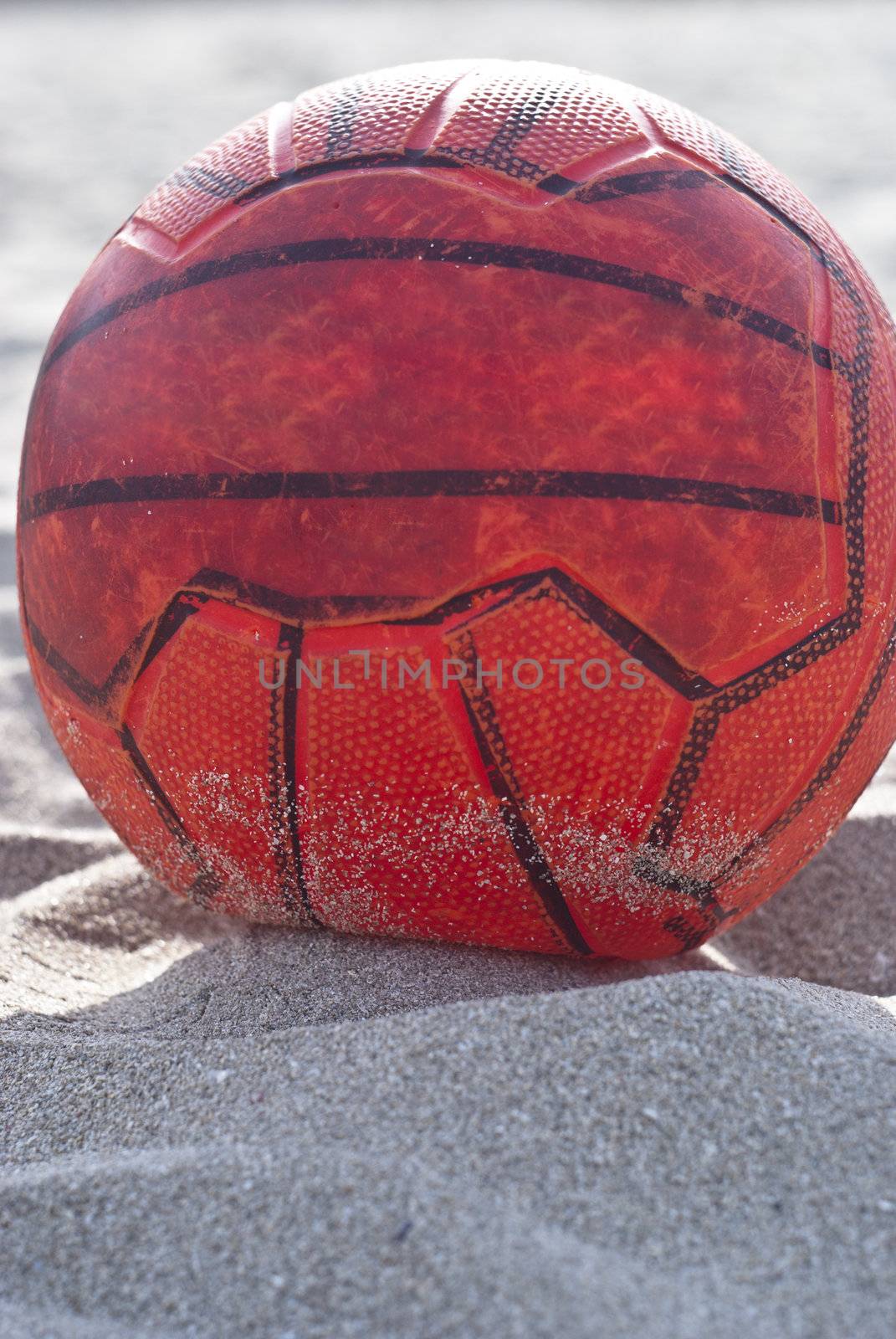 orange soccer ball by gandolfocannatella