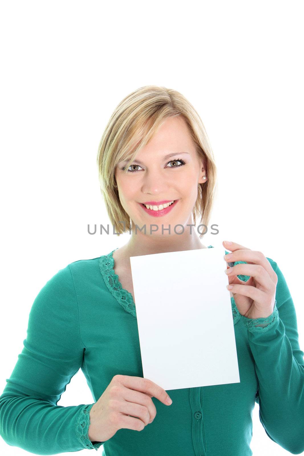 Smiling young blonde woman holding a blank page of paper or card for your use as a certificate, document or for advertising Smiling young blonde woman holding a blank page of papewr or card for your use as a certificate, document or for advertising