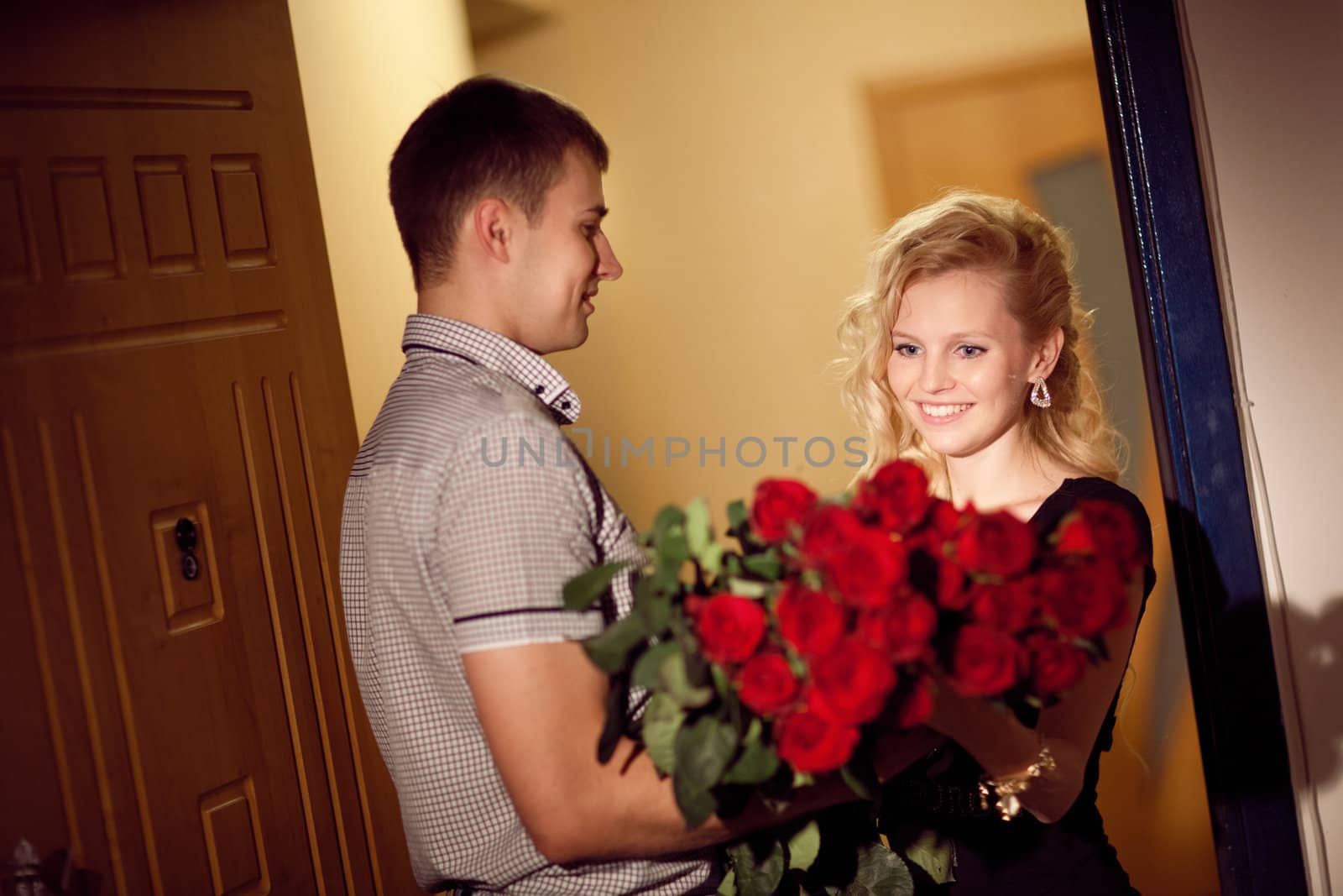 man gives roses to a girl by vsurkov