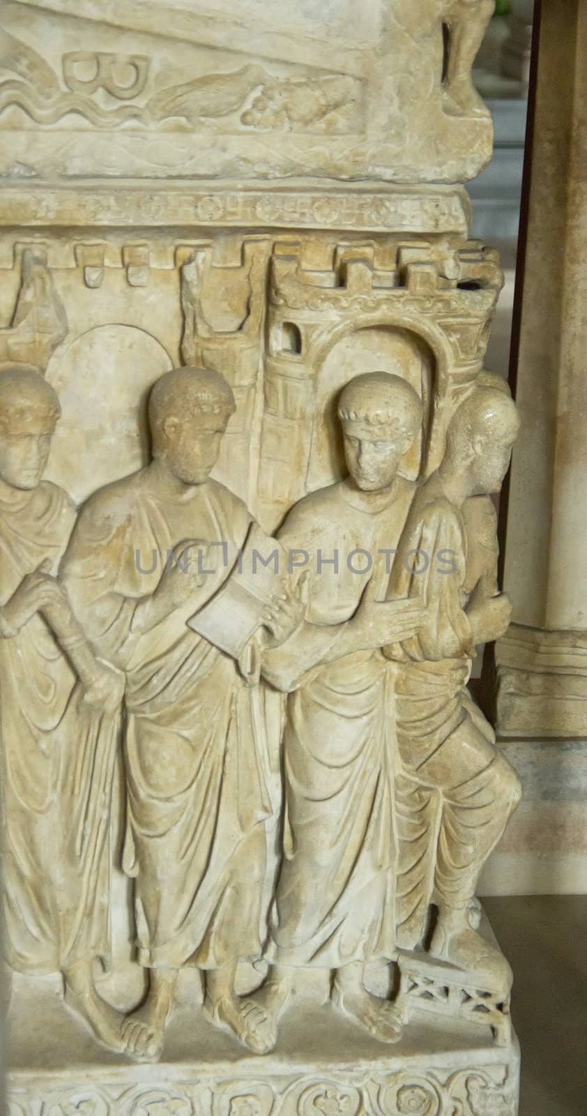 Ancient sculpture inside Basilica of Sant'Ambrogio, in Milan, Italy