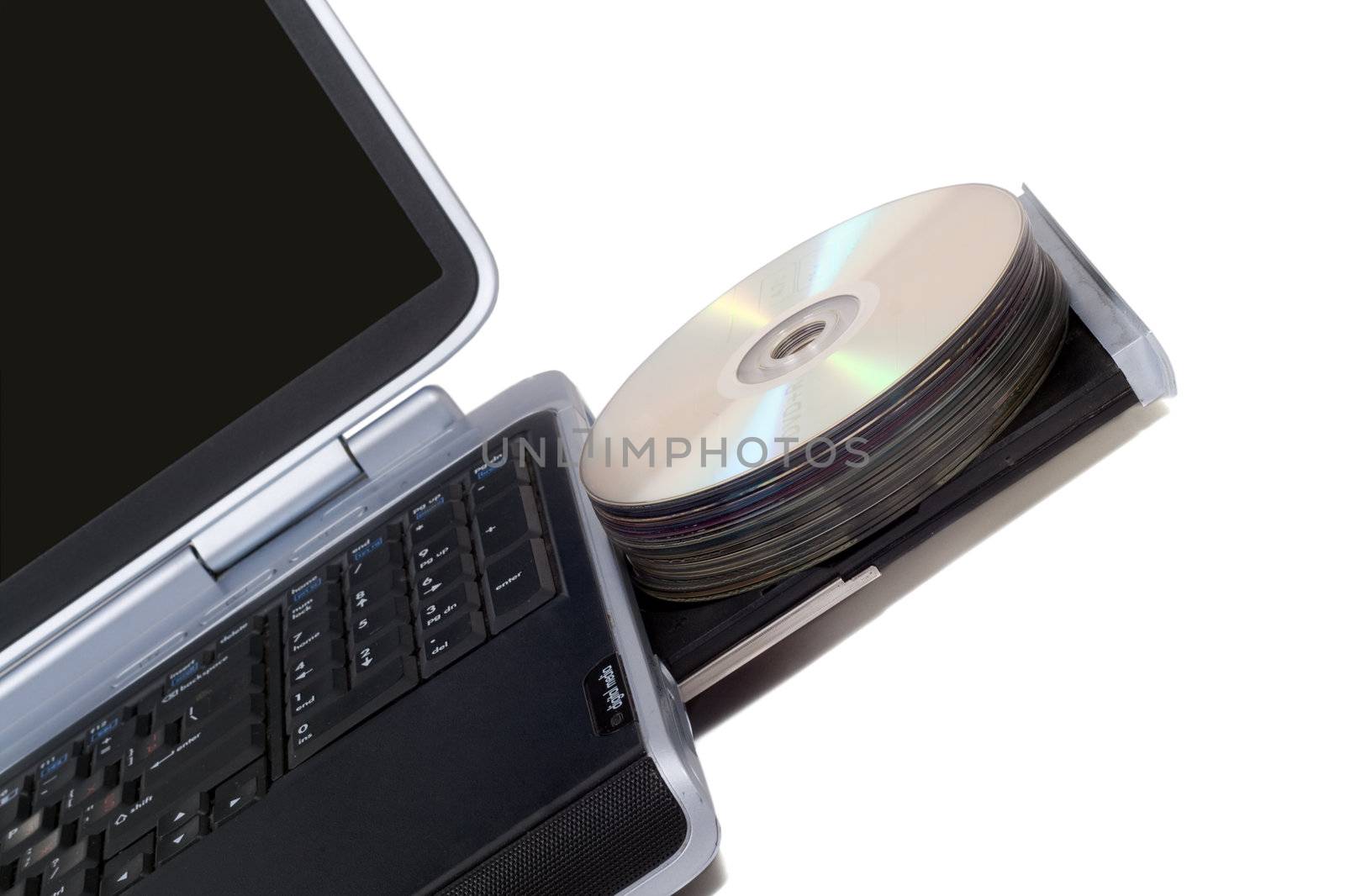 Laptop with overloaded DVD Drive. Isolated on white