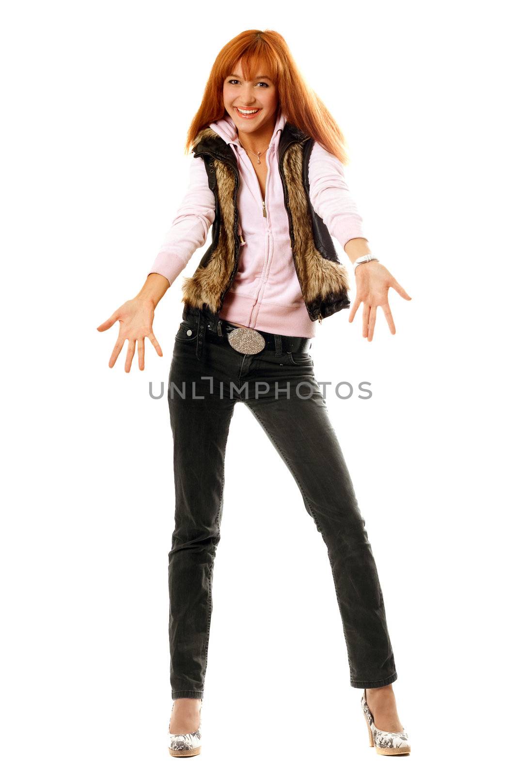 Joyful red-haired young woman dressed in casual clothes