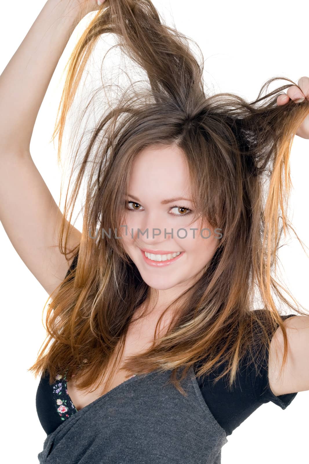 Portrait of the smiling playful girl. Isolated