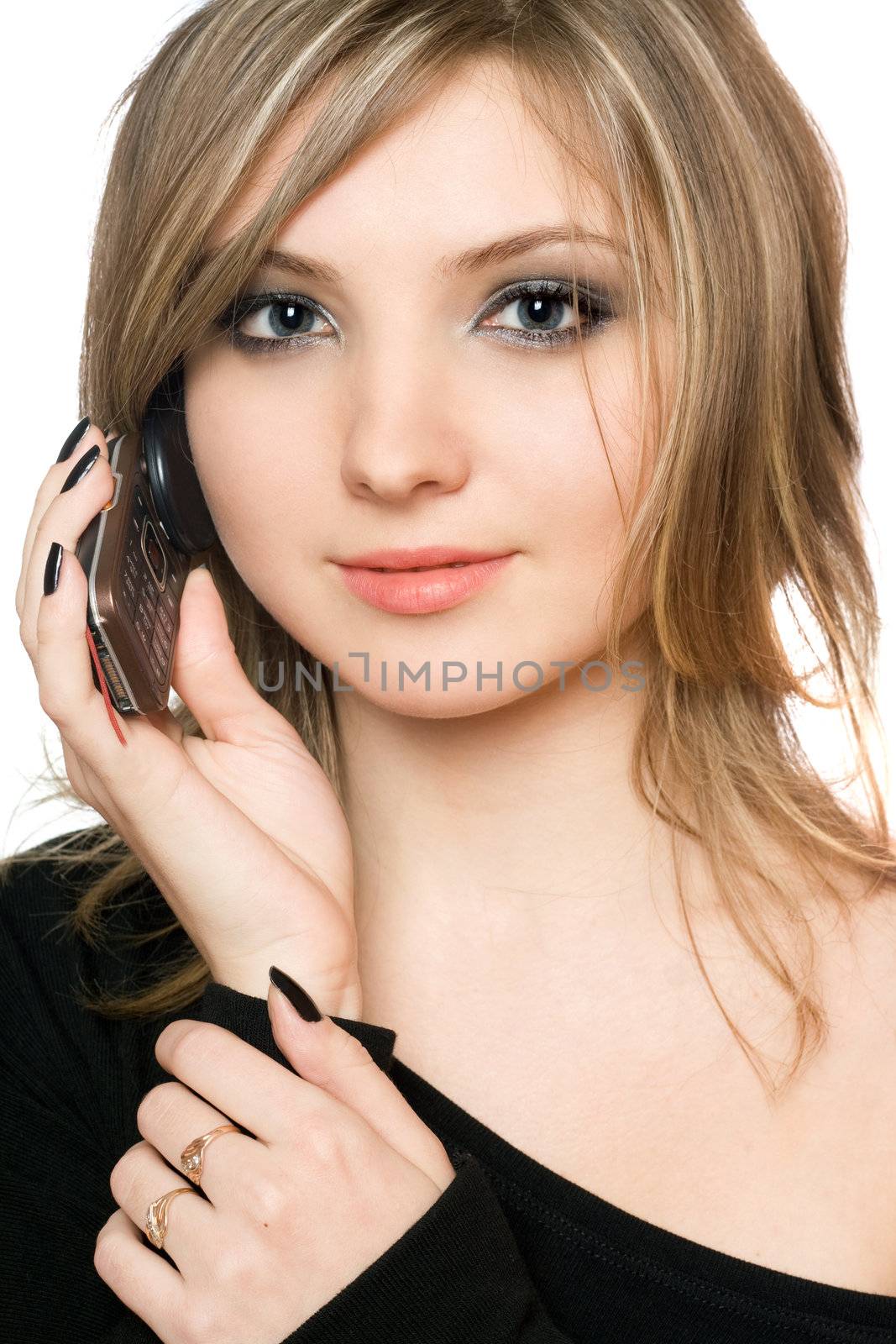 Close-up portrait of pretty girl with a phone in her hands