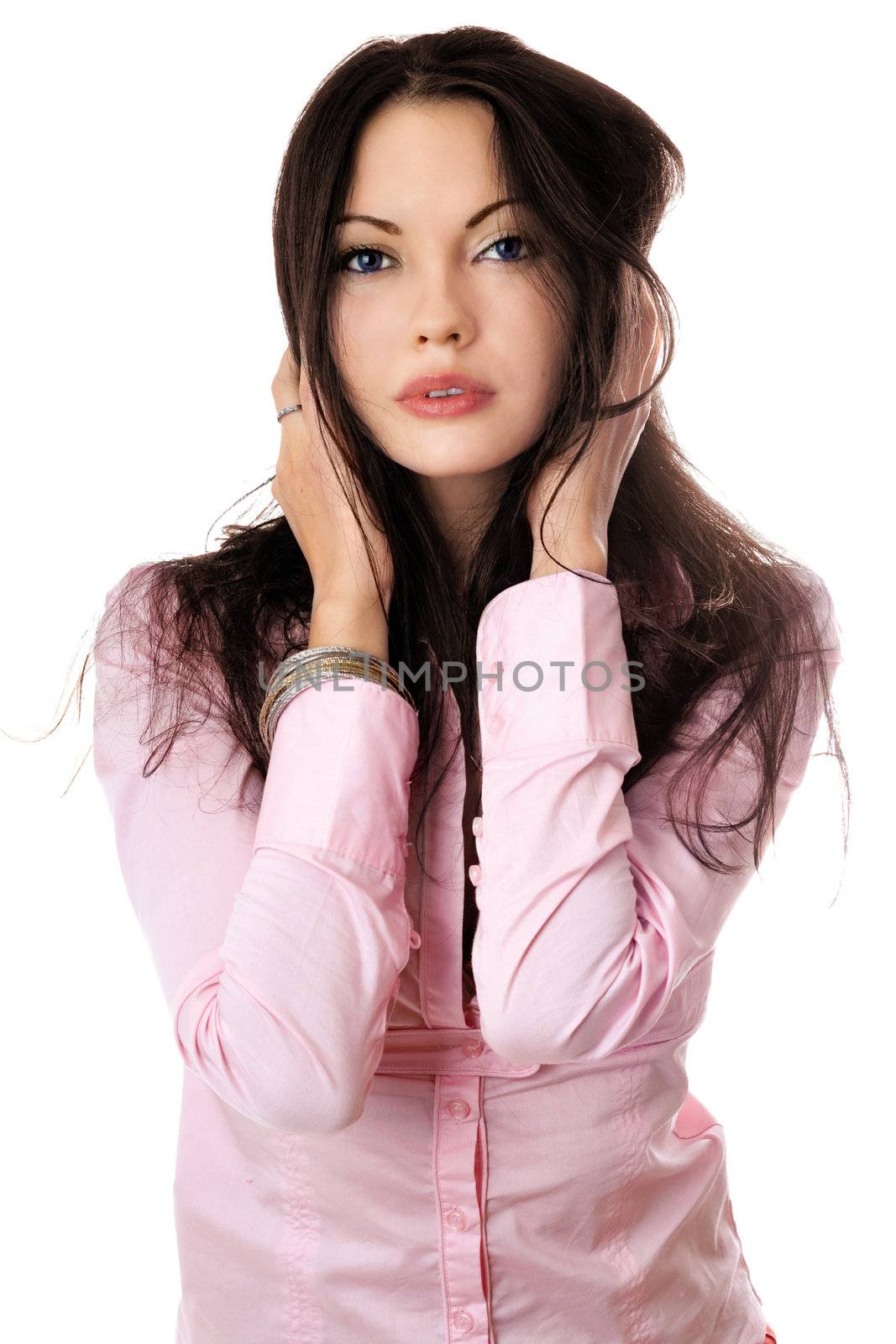 Portrait of pretty young woman in pink shirt
