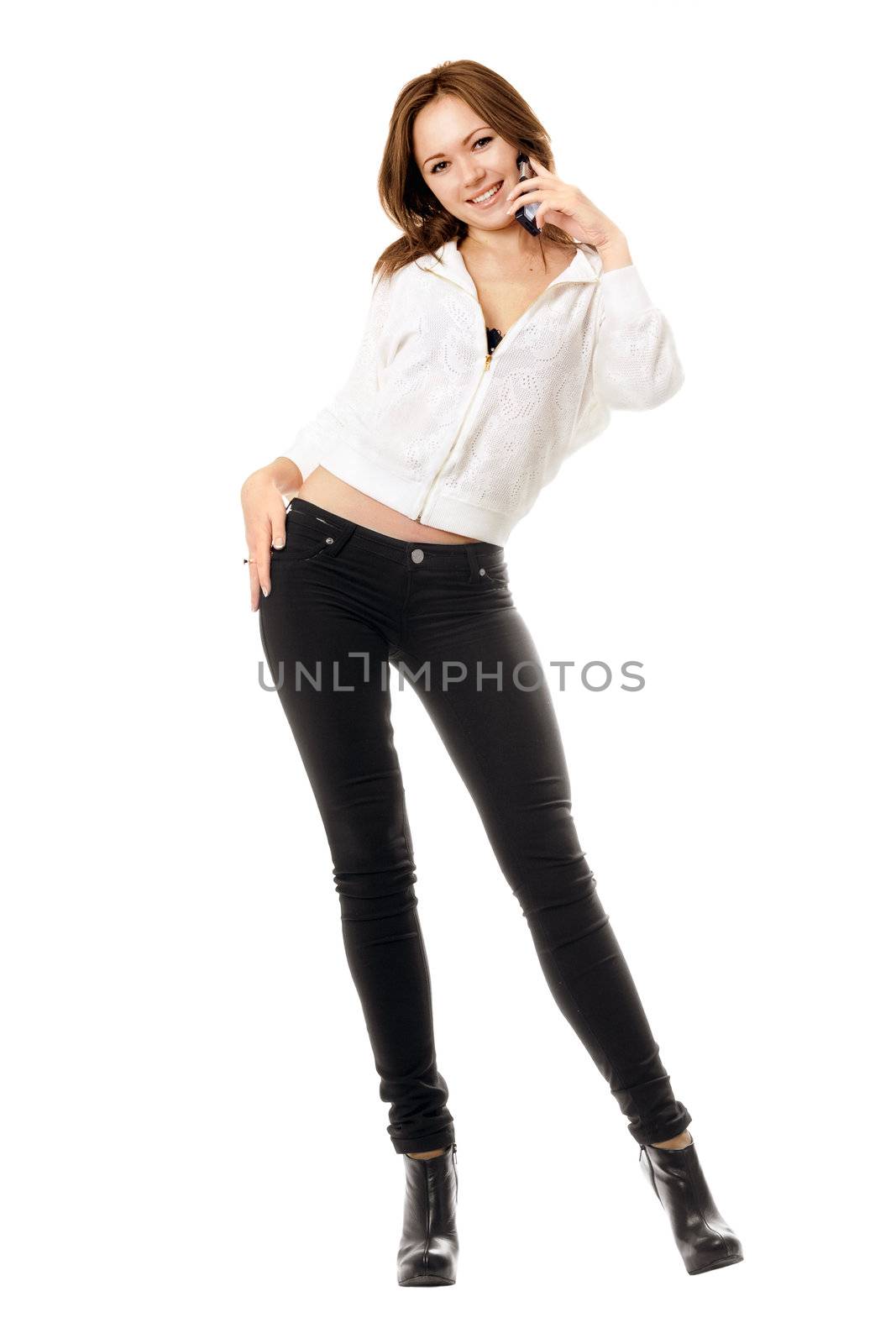 Cheerful young woman talking on the phone. Isolated