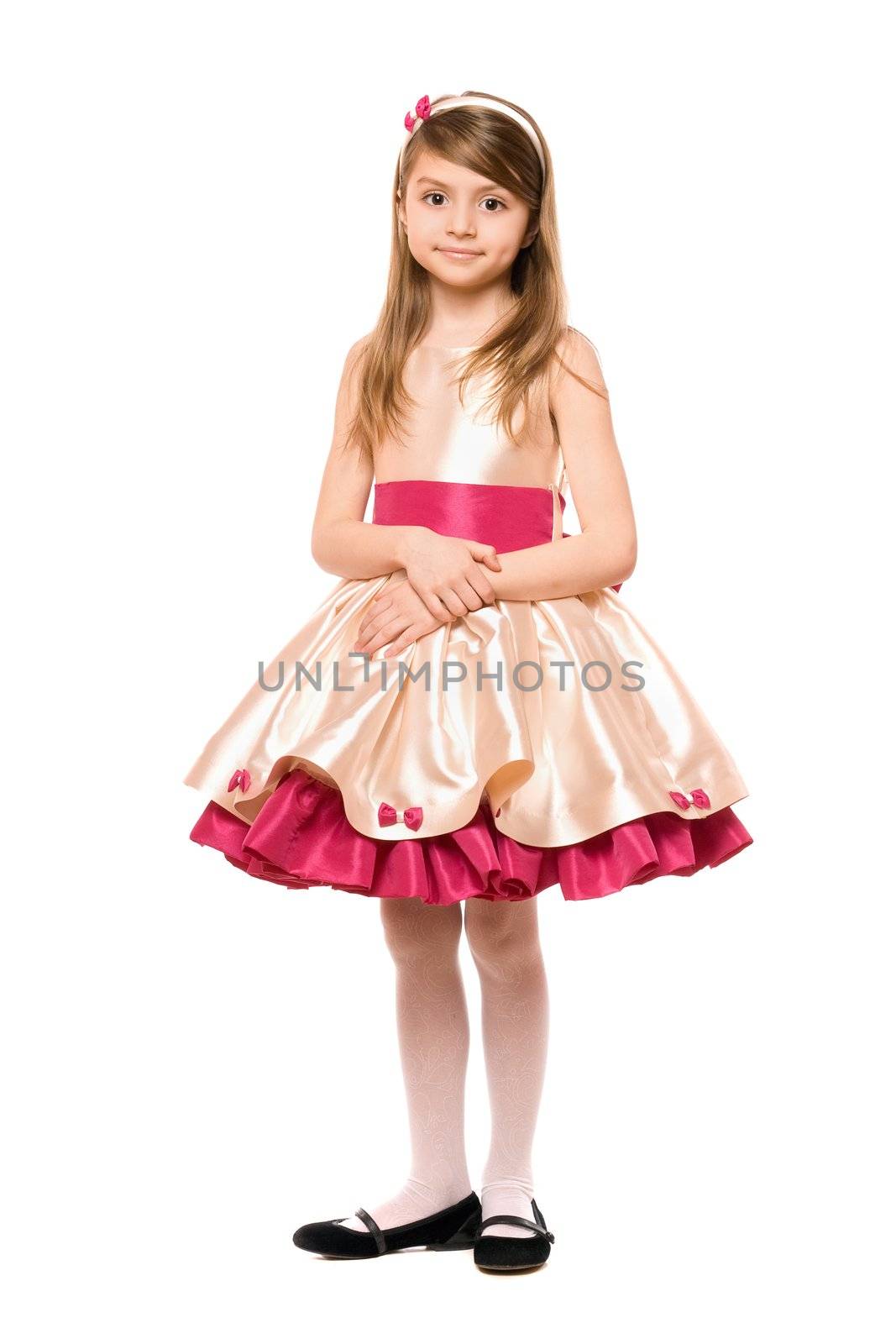 Beautiful little lady in a dress. Isolated